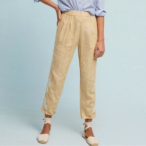 Anthropologie loose yellow linen striped pants